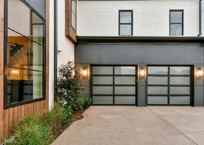 Modern home with window garage doors