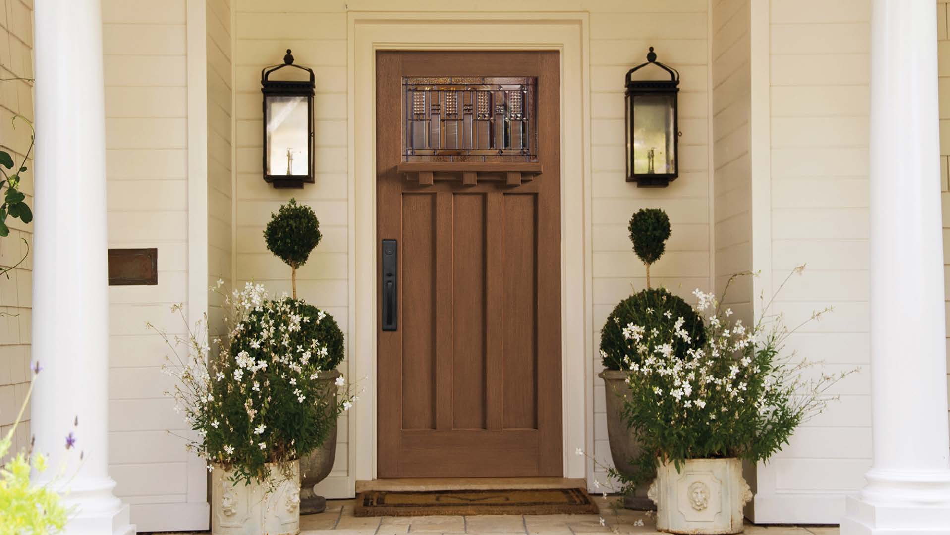 White front door with filigree wire pattern